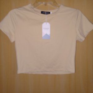 Juniors Tan crop top.